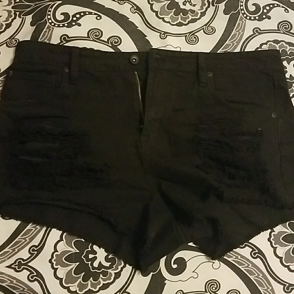 Black ripped shorts